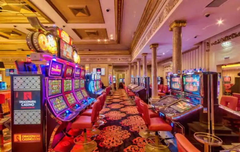 astonbet login Three Card Poker live dealer table showing community cards and payout structure